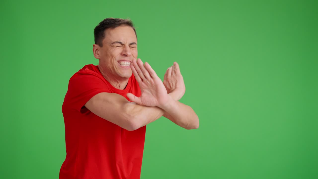 Man arguing with someone on green screen background