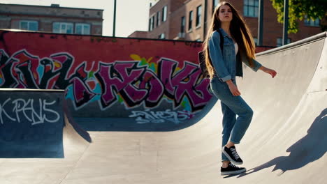 young woman standing in a skatepark