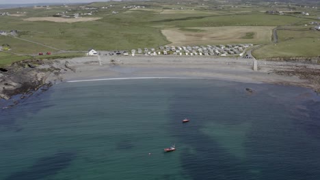 Aerial-dolly-across-Malbay,-view-of-Whitestrand-beach,-Milltown-Malbay