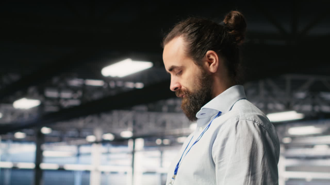 Programmers on data center industrial platform checking code on tablet