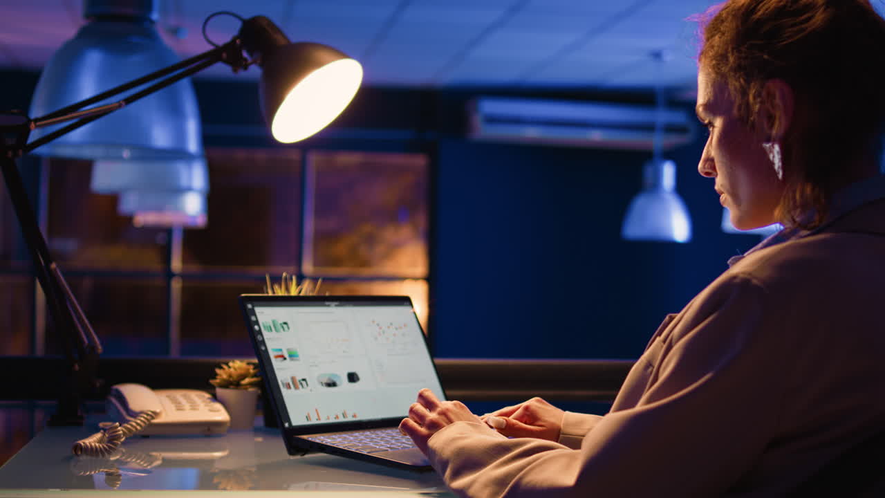Woman working on laptop in office
