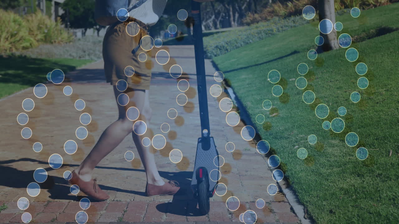 Person riding scooter on brick path with bubble animation overlay