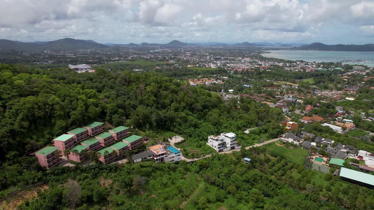 Thailand, Phuket, Rawai Mueang district on a beautiful sunny day aerial view over a luxurious resort.