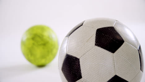 football kept against white background 4k