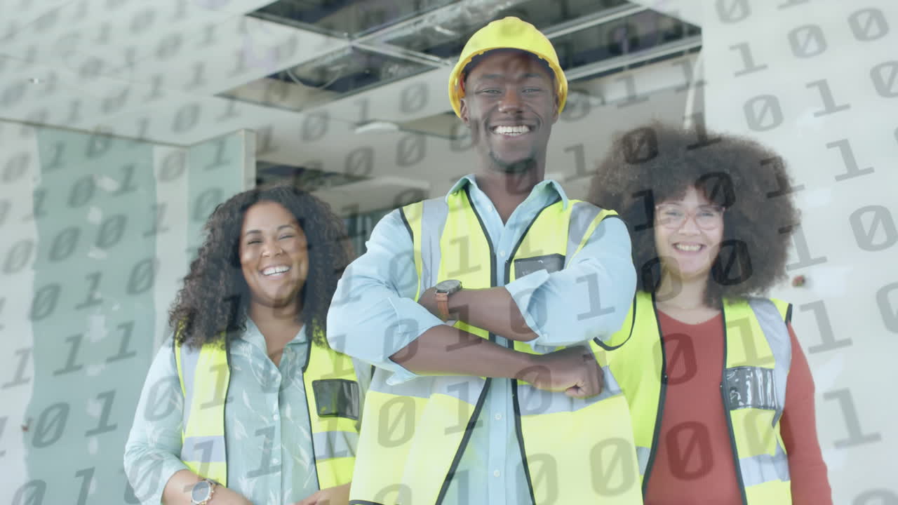 Animation of binary coding data processing over diverse engineers in hi vis vests