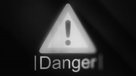 danger alert sign on a pixelated display