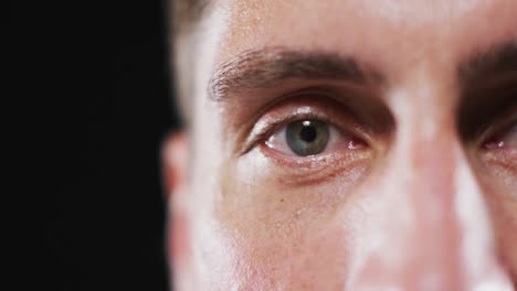 close up portrait of face of caucasian man with focus on eye