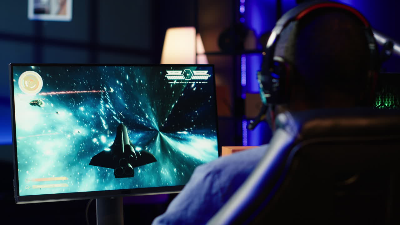 Media star using headset mic to chat with viewers, filming gaming tutorial