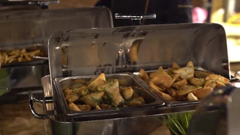 view of food in open buffet, close up shot