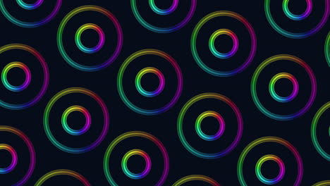 Dynamic rainbow circles a vibrant pattern on a black background