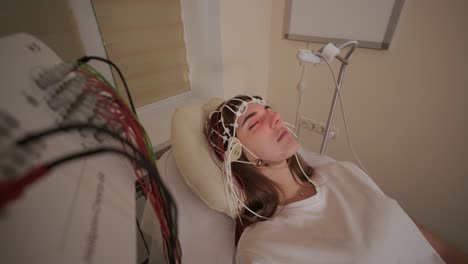 patient brain testing using encephalography at medical center