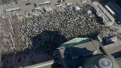 drone above vancouver art gallery with view of ukraine supporters protesting russian invasion in british columbia, canada