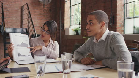 Steadicam-shot-in-of-diverse-business-team-meeting