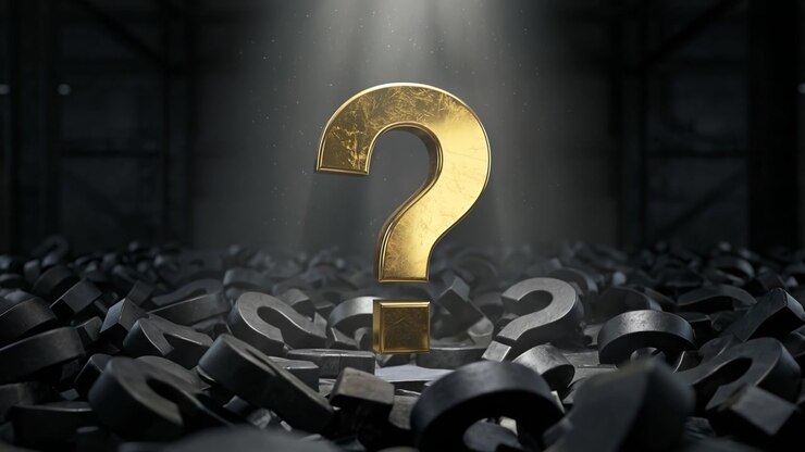 Golden question mark symbol standing out among a large group of dark gray question marks