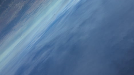 an acrobatic flight pilot performing a barrel roll as seen from the pilot’s perspective