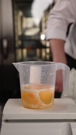 chef preparing eggs for baking