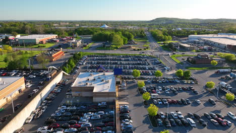 aerial descending shot of full parking lot