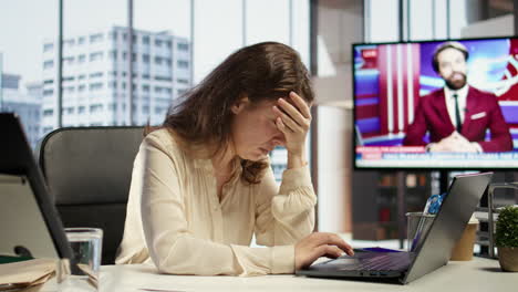 frustrated sleepy general director suffering form a migraine from workload