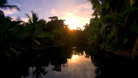 submerged sunset in tropical river