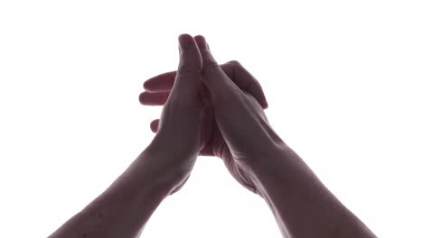 Man-Hands-With-Interlocked-Palm-And-Fingers-Against-White-Background---close-up,-studio-shot