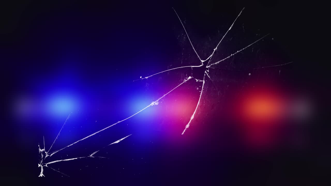 Cracked glass with flashing red and blue emergency lights. Shattered glass with pulsating red and blue emergency lights. Abstract background for crime, emergency, danger, security concept