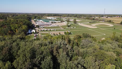 Shiawassee-County-fairgrounds,-reveal-ascend-aerial-view