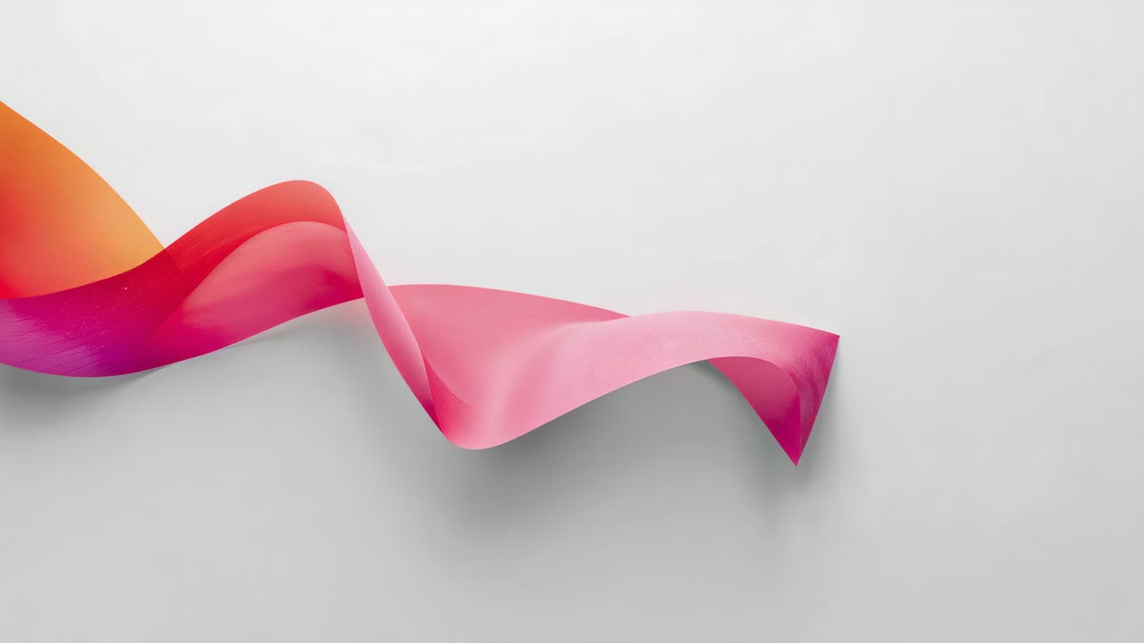 From frame one sliding ribbon twisting across gray set showing pink-orange gradient and soft shadow