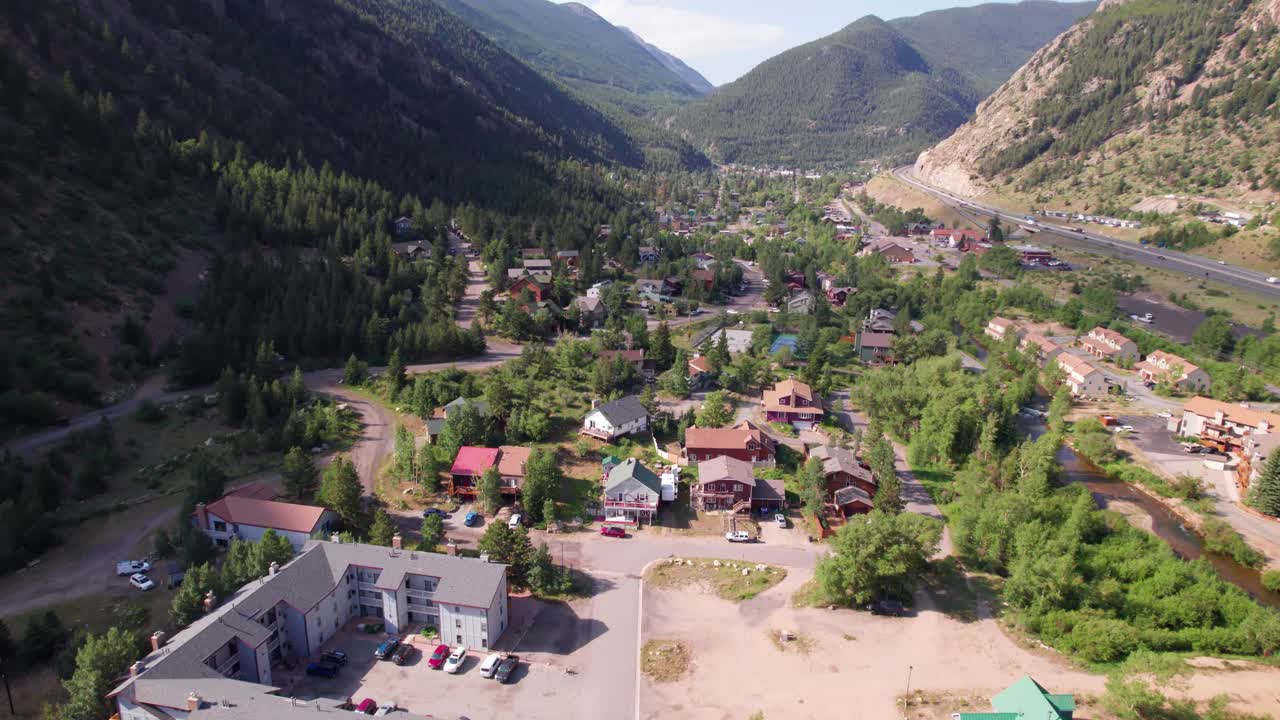 Aerial video of Georgetown Colorado. Camera is heading approximately south over the city.