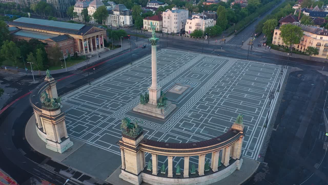 Drone footage of the empty Heroe's Square in Budapest, Hungary at the time of the Covid virus. Early morning at the sunrise in spring.
Drone circles.