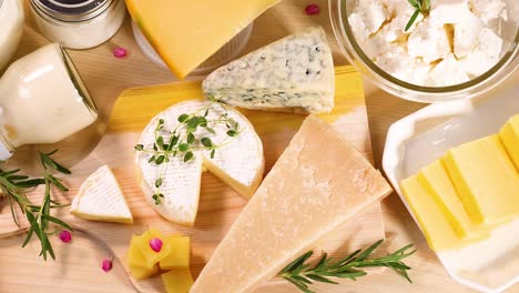 variety of dairy products on wooden background