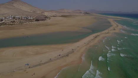 Sotavento-Beach,-Fuerteventura:-wonderful-aerial-view-in-orbit-of-the-fantastic-beach,-on-a-sunny-day