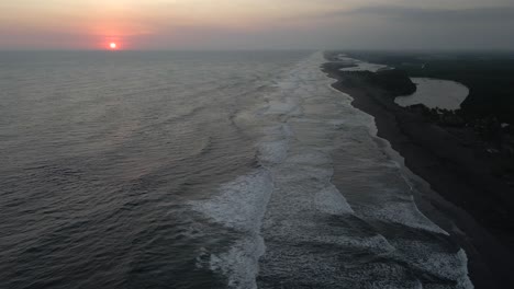 guatemala pacific ocean coast coastline el paredon beach sunset aerial drone