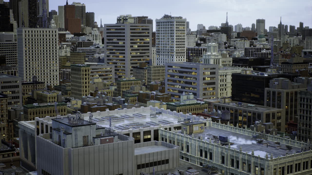City skyline at dusk with illuminated buildings and urban landscape