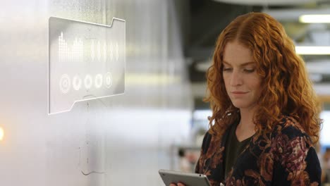 digital interface against woman using digital tablet in office