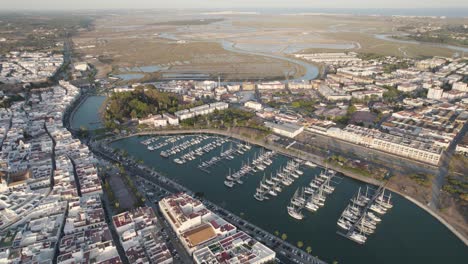 aerial ayamonte village descend to sailing boats on beautiful marina - huelva