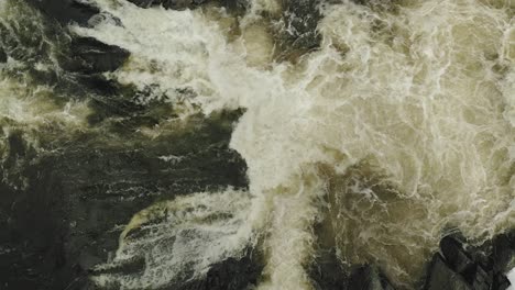 hypnotic aerial birds eye view over tobey fall slow motion ascending 4k