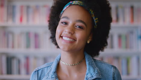 happy, black woman and face at library to study