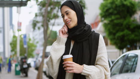 woman in hijab using mobile phone in the city 4k