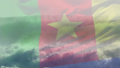 Composición-Digital-De-Ondear-La-Bandera-De-Camerún-Contra-Las-Olas-En-El-Mar