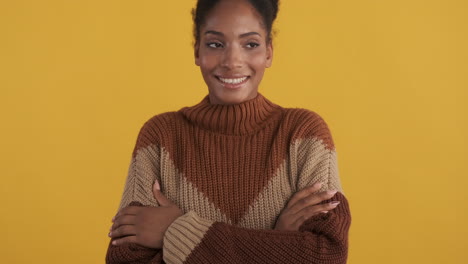 Happy woman with big smile and crossed arms