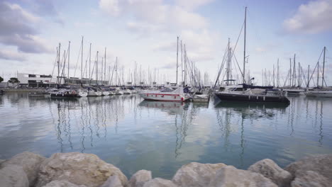 harbour regatta boats decked to sail at port ginesta barcelona