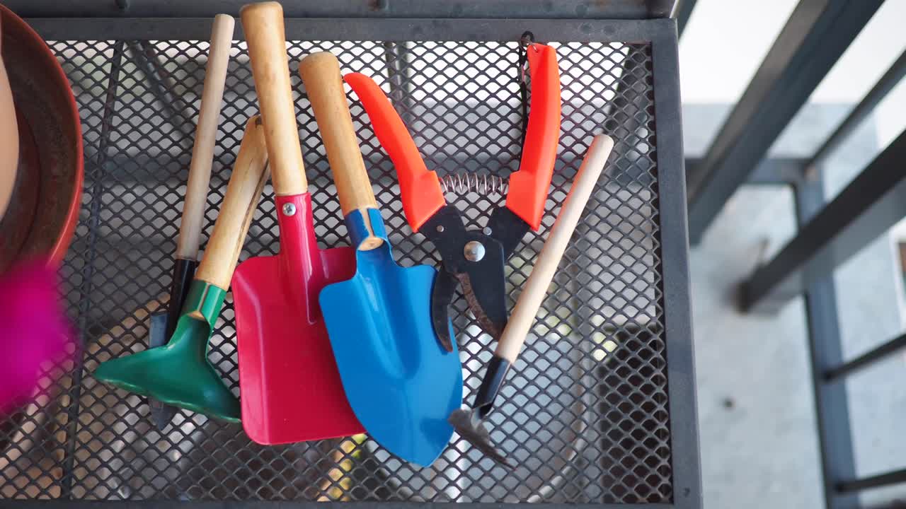 Gardening Tools on a Metal Grid