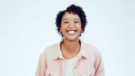 Joke,-smile-and-funny-with-face-of-woman-in-studio