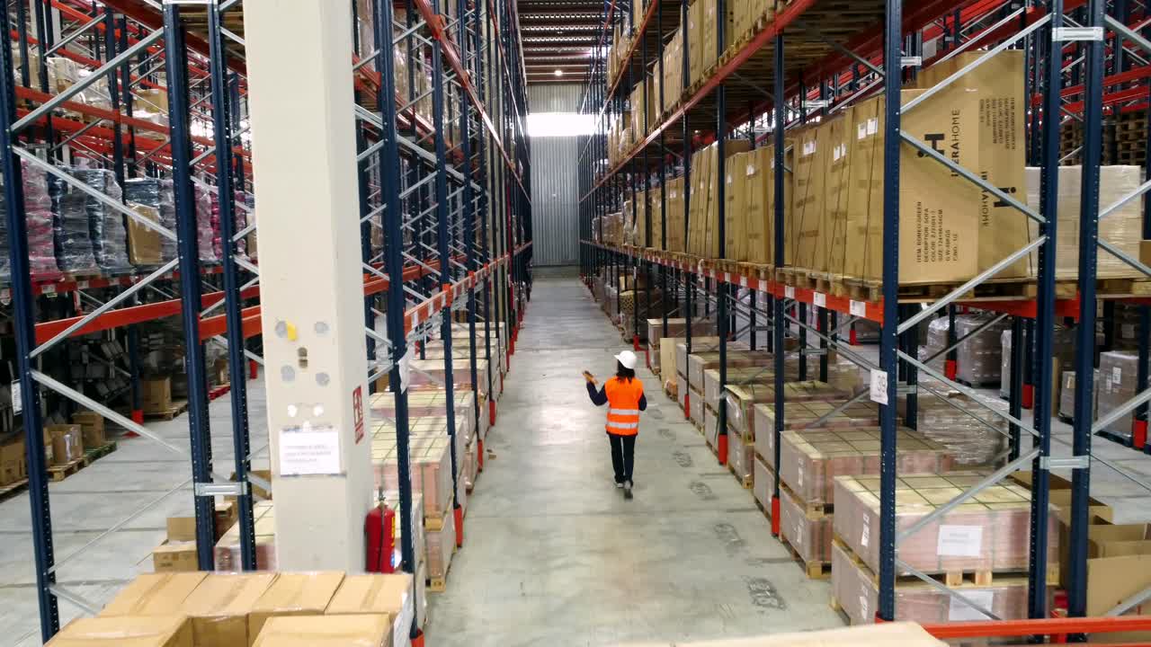 Warehouse Interior with Boxes and Workers