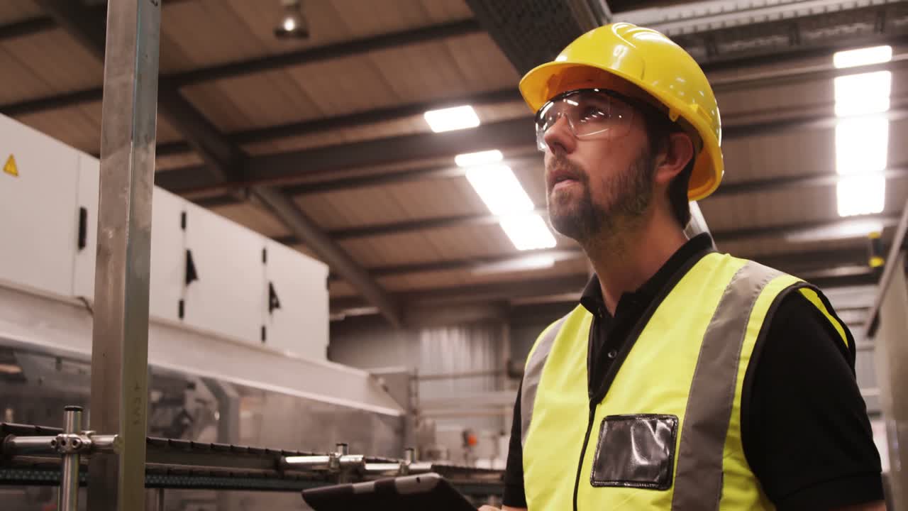 Engineer maintaining record in clipboard