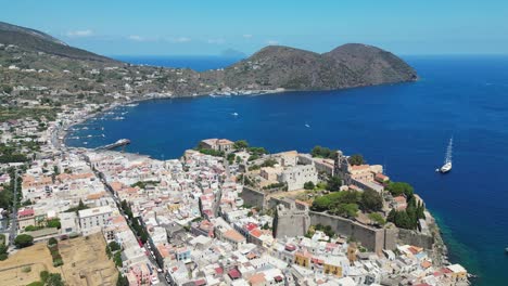 lipari old town, city wall and cathedral at aeolian islands, italy - aerial 4k