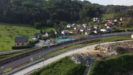 aerial headshot of sports facilities in residential complex in lasko town, slovenia