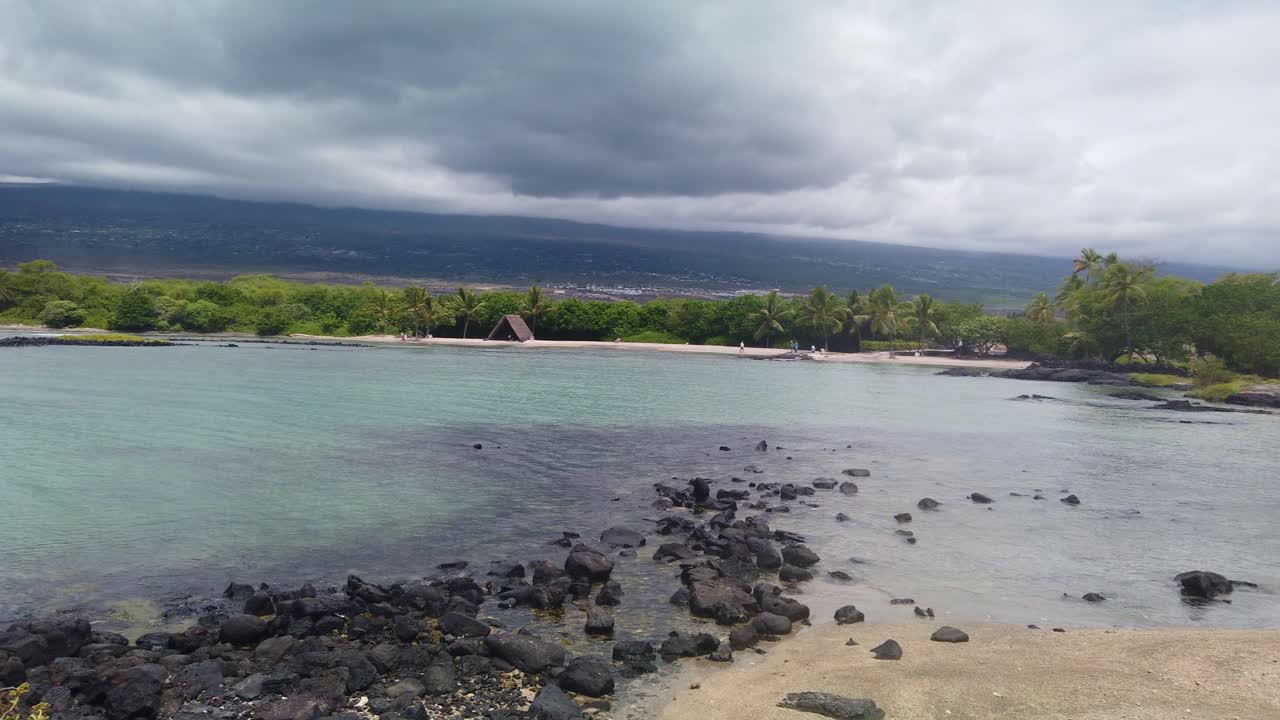 Gimbal wide panning shot of the sacred beach at Kaloko-Honokōhau National Historical Park on the Big Island of Hawai'i