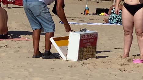 Portuguese-cakes-in-a-bar-window---berlin-balls-being-delivering-on-beach