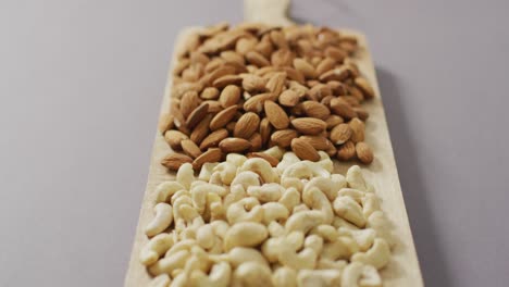 video of almonds on wooden chopping board